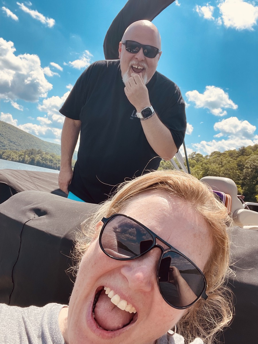 Corey and Heather laughing on the boat