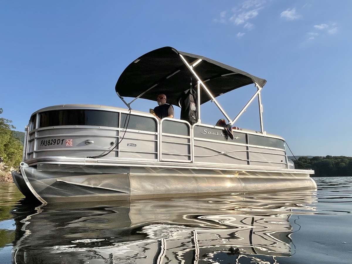 The pontoon boat, out on the lake